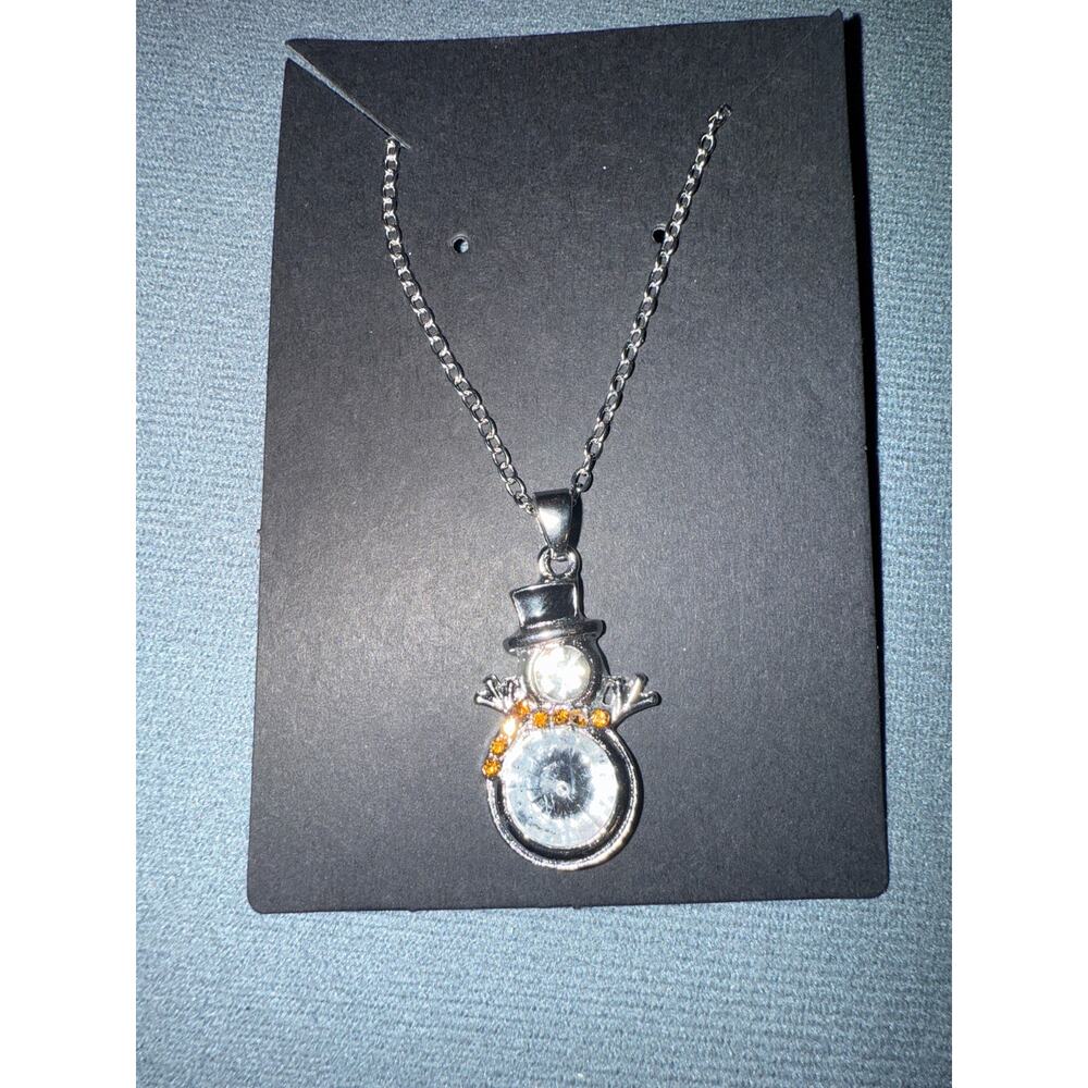 NWT Silvertone Snowman pendant necklace with large white stone, rhinestone scarf